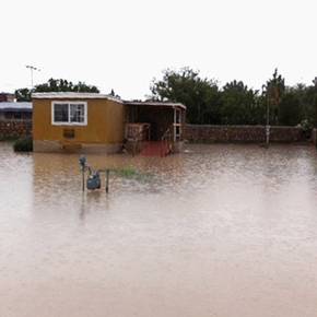 Colonias program promotoras help Socorro flooding victims